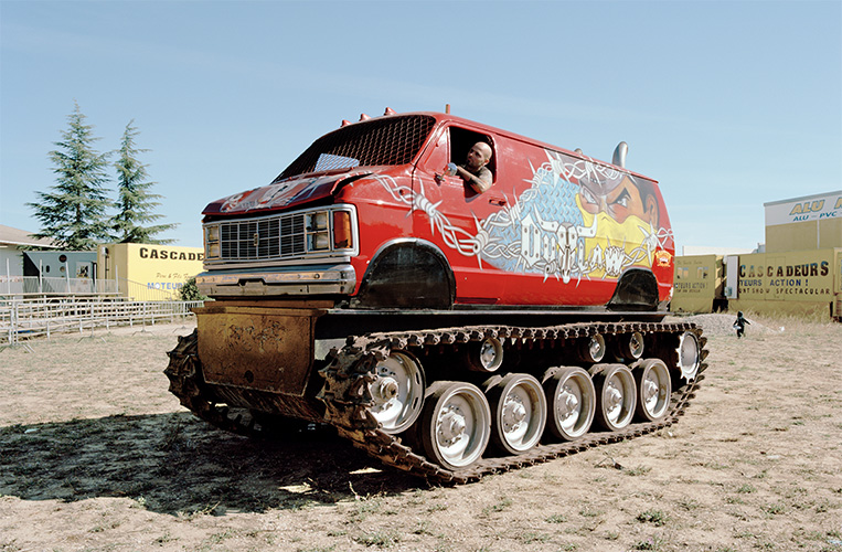 Caterpillar track and stuntman, from series ATLAS 2012